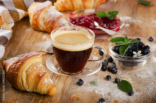 Coffee and fresh croissants for a breakfast