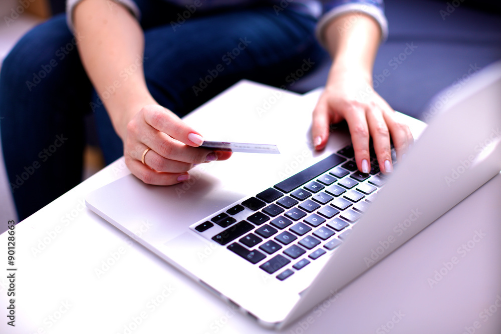 Young businesswoman working on a laptop Young businesswoman working on a laptop