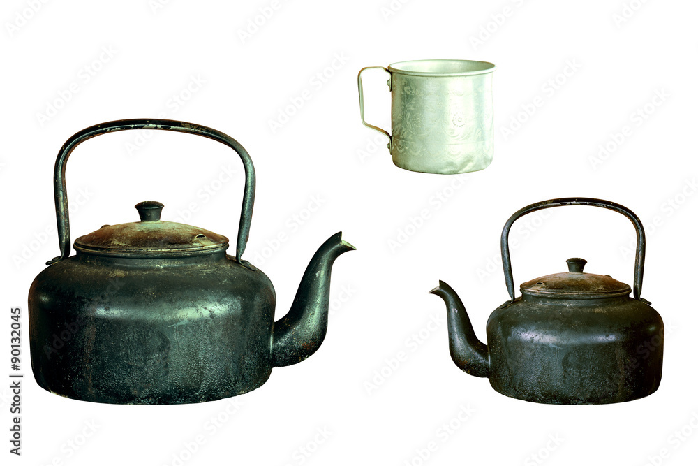 Old aluminium kettle and cup old-style retro isolated on white b Old aluminium kettle and cup old-style retro isolated on white b