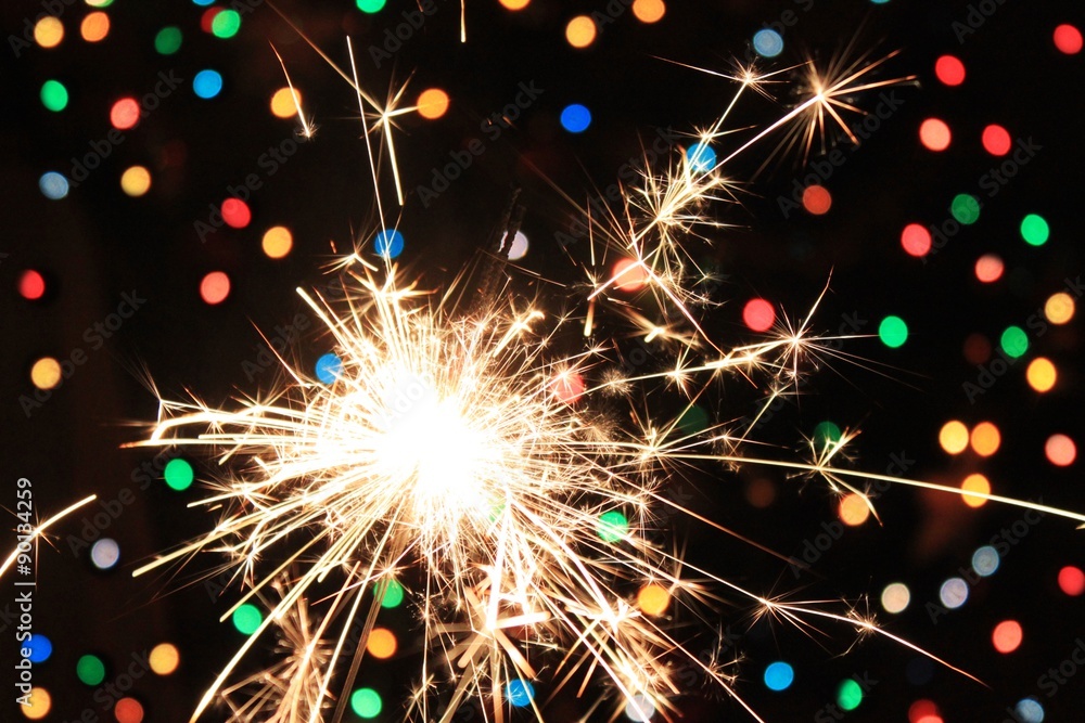 Fototapeta premium Celebrating background Sparkle bright confetti bokeh new year night festive 