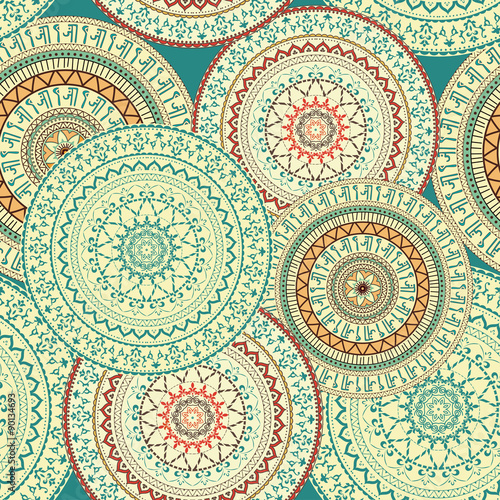 Mandala. Indian, Arabic, Persian pattern. Arabesque. Colorful seamless background with circular ornaments in ethnic style.