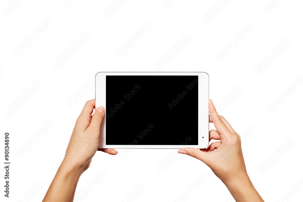 Woman hands holding contemporary generic tablet pc with blank sc