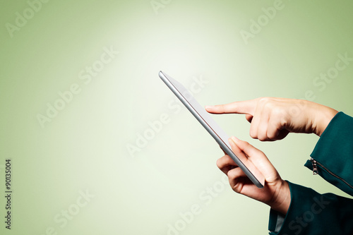 Business woman hands holding digital tablet pc with blank screen
