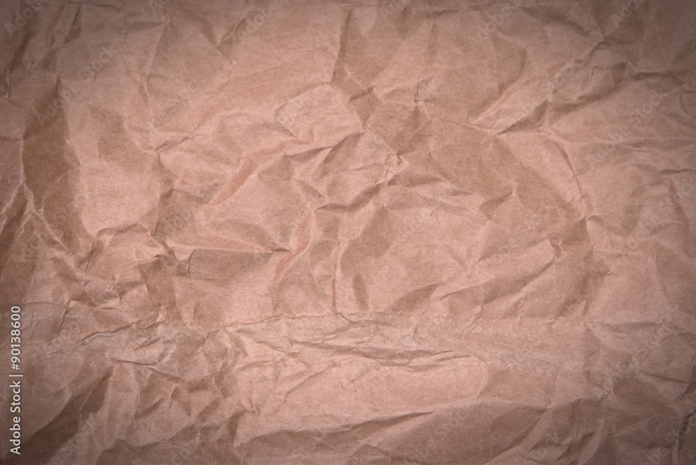 Fototapeta premium crumpled brown paper background or texture