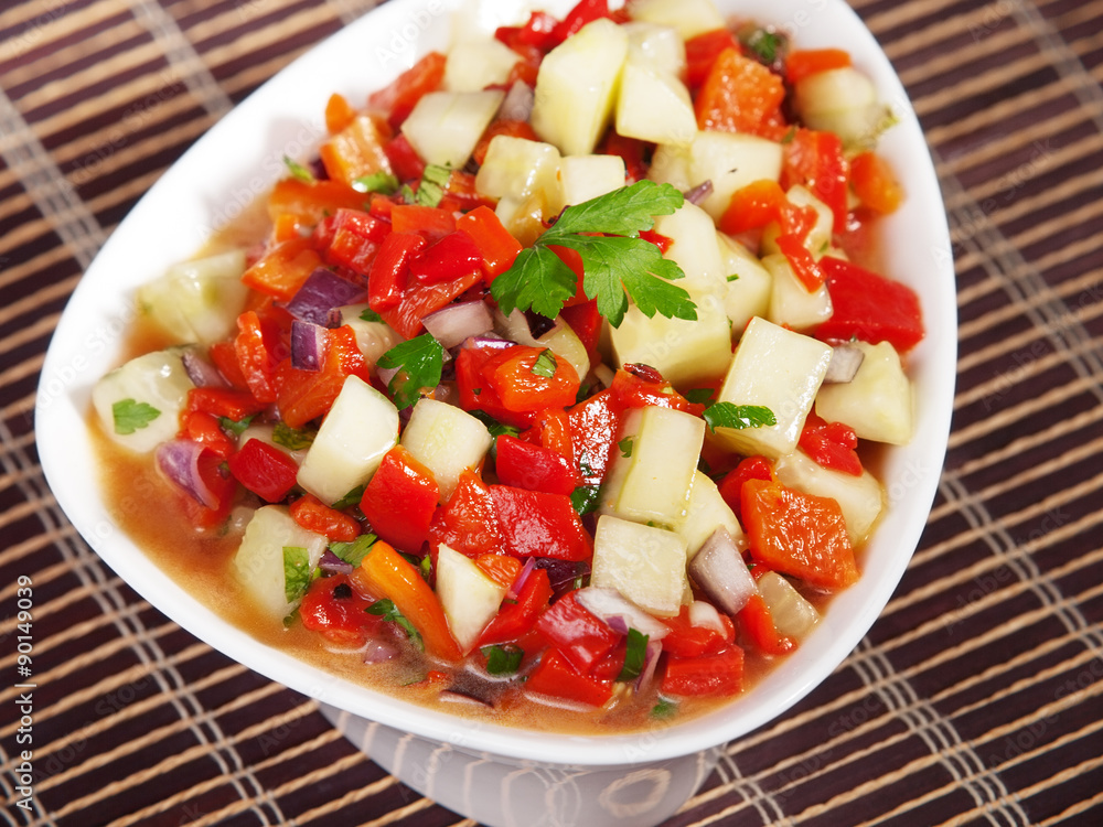 Salad with baked peppers and cucumbers