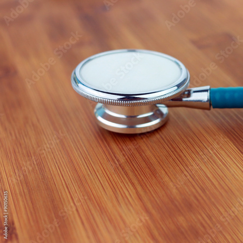 Stethoscope  on a wood background