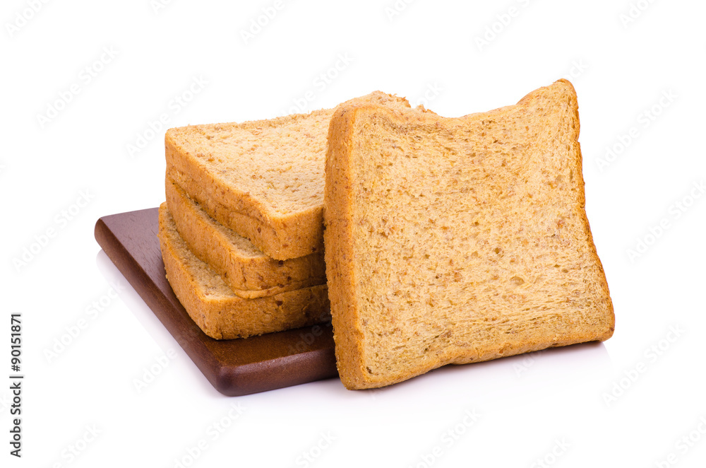 Slice of a whole wheat bread isolated on a white background Slice of a whole wheat bread isolated on a white background