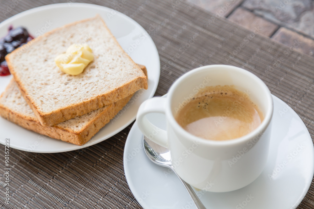 Breakfast with toast and coffee. Breakfast with toast and coffee.
