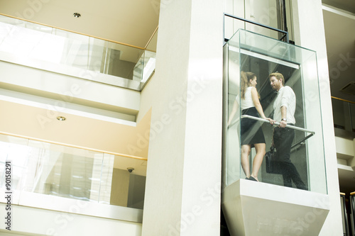 Man and woman in the elevator