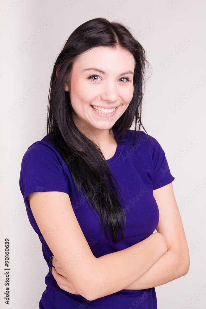portrait of a young smiling girl on a white portrait of a young smiling girl on a white