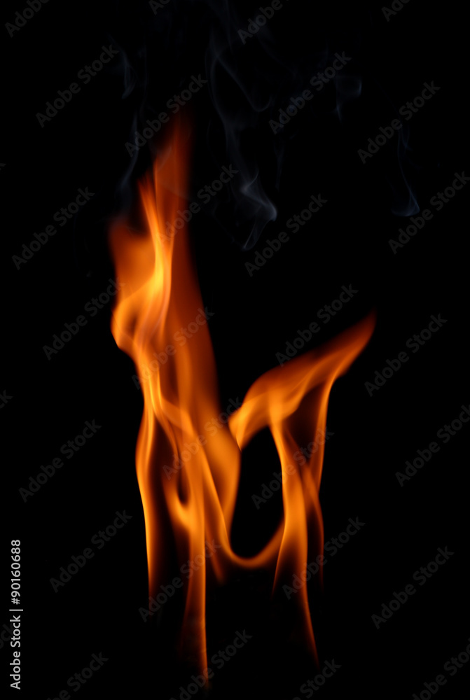 Fototapeta premium Fire flames on a black background