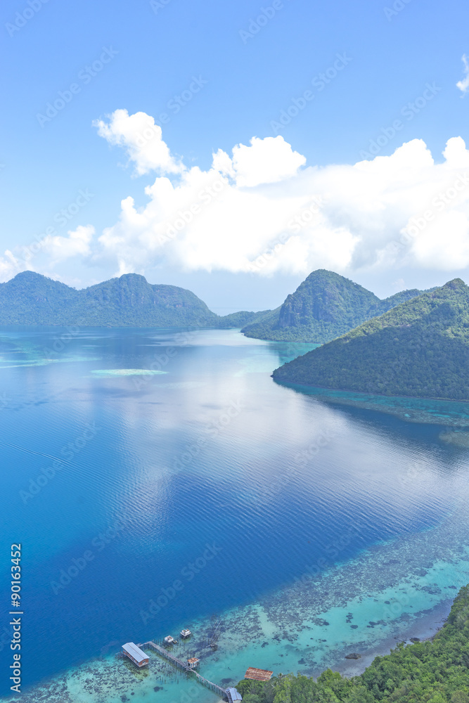 Fototapeta premium Aerial view of tropical island of Bohey Dulang near Siapdan Island, Sabah Borneo, Malaysia.