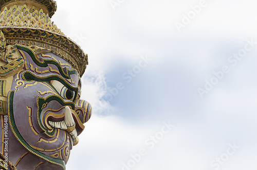 Face of Giant at Wat Phra Kaew or The Emerald Buddha temple have many of the statues and figurines there are characters from the Ramakien photo