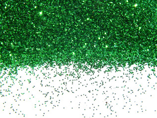 Green glitter sparkle on white background
