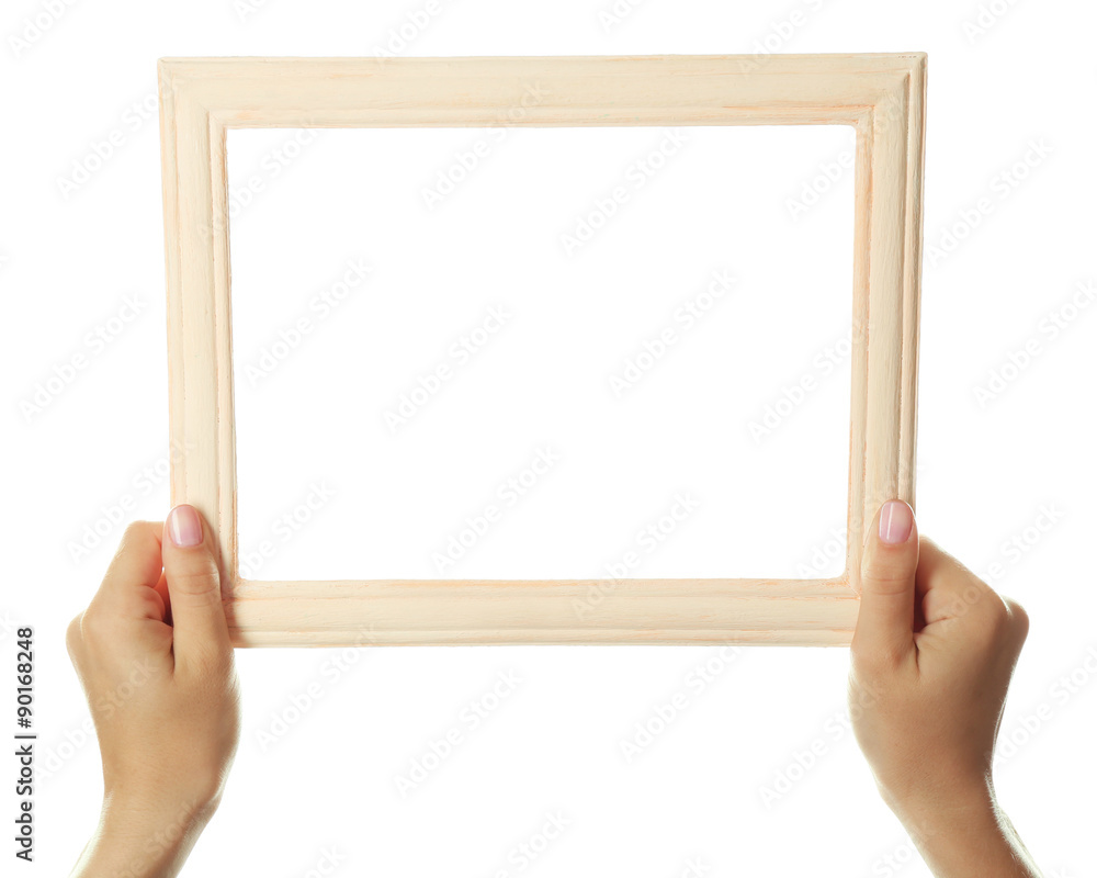 Female hands with wooden frame, isolated on white Female hands with wooden frame, isolated on white