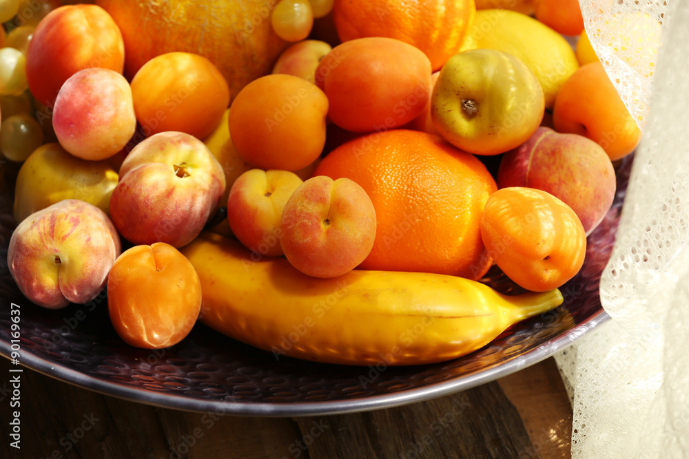 Heap of fresh fruits on tray close up Heap of fresh fruits on tray close up
