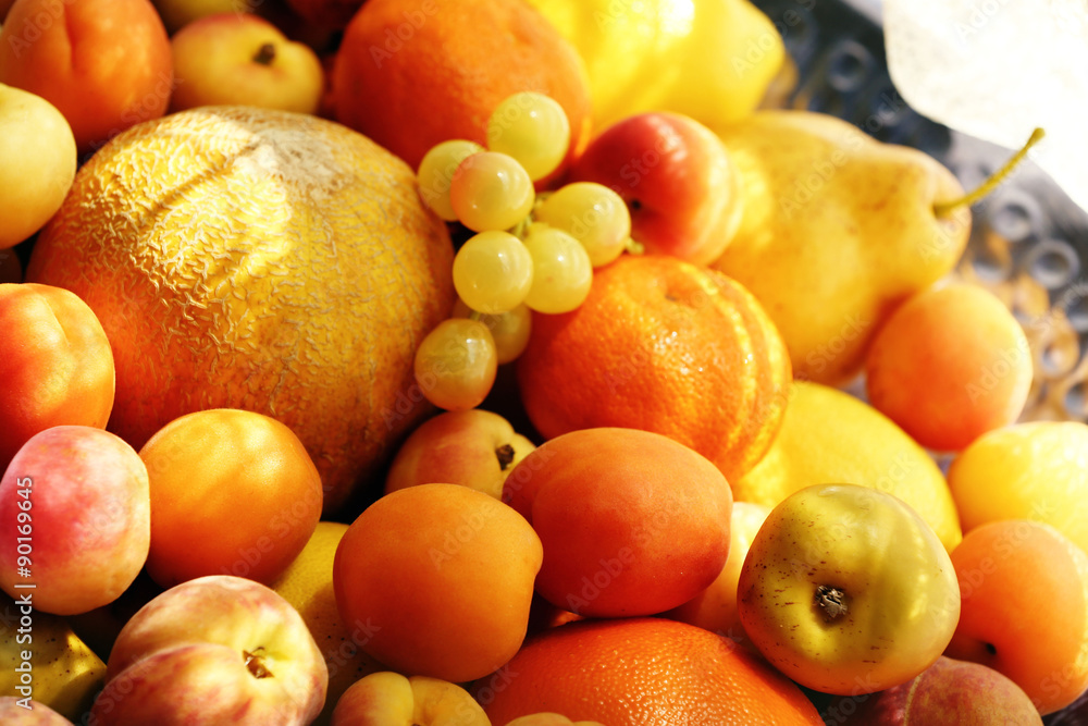 Heap of fresh fruits on tray close up Heap of fresh fruits on tray close up