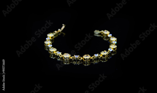 Jewelry accessories - bracelet with sapphire on a black backgrou