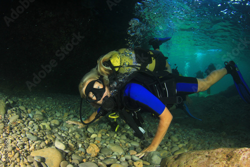 Blonde woman scuba diver