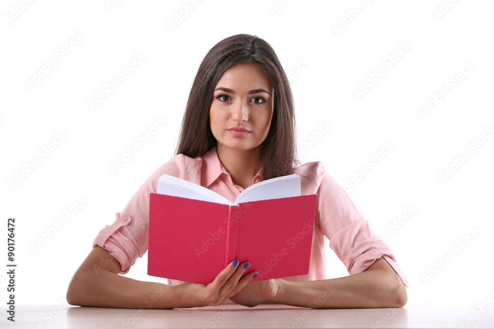 Young girl reading book isolated on white Young girl reading book isolated on white