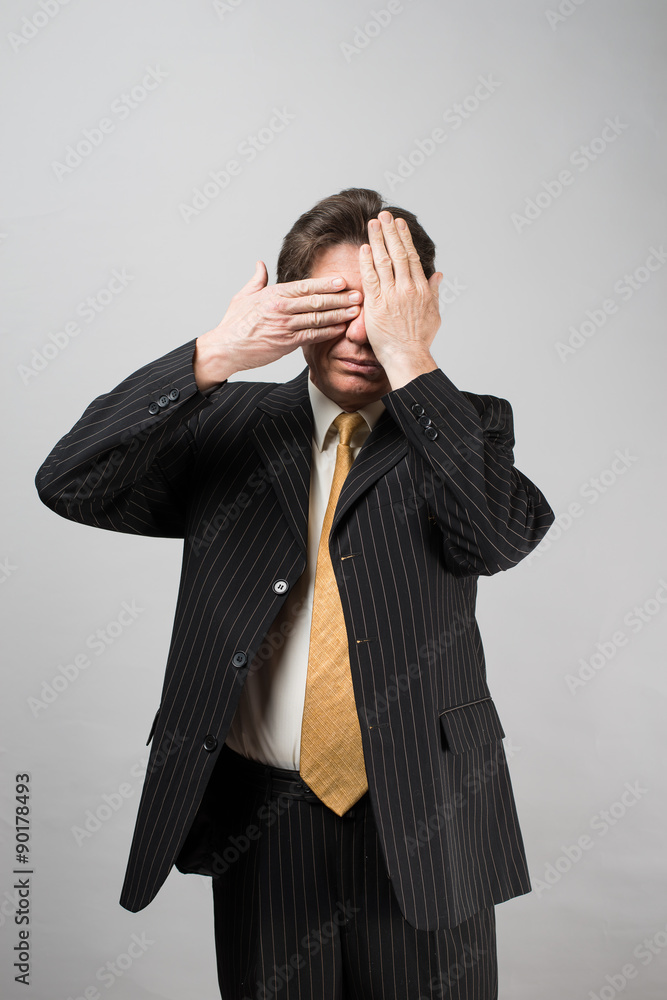 businessman closed his eyes, his hands businessman closed his eyes, his hands