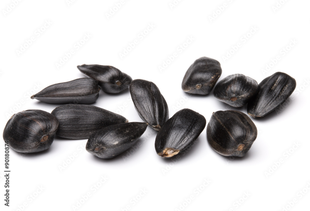 Sunflower seeds isolated on white background close up Sunflower seeds isolated on white background close up