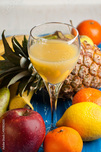 fresh various fruits with juice
