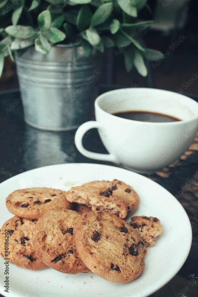 Hot coffee with chocolate cookies Hot coffee with chocolate cookies