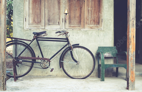 Vintage bicycle in coffee house, retro instagram effect