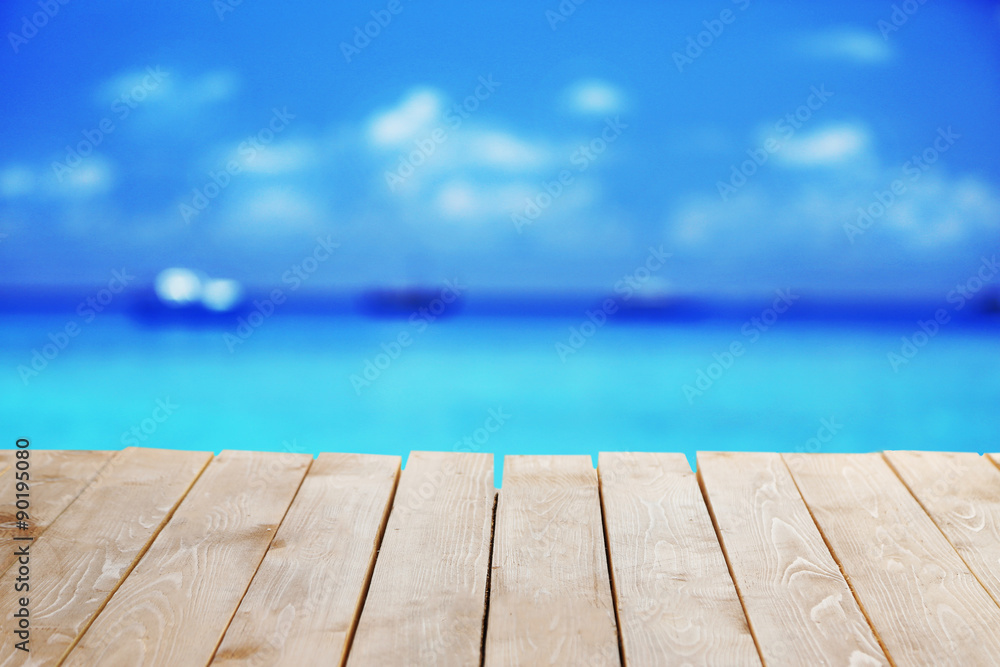 Wooden table with abstract blur background Wooden table with abstract blur background