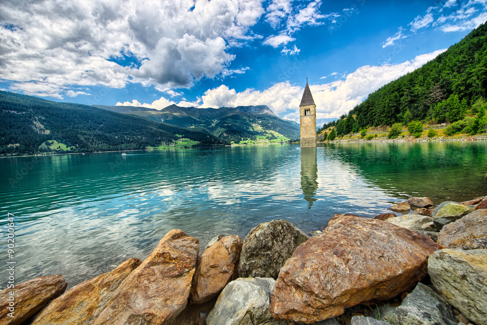 Obraz premium Bell tower of the Reschensee (Resia) South Tyrol Italy