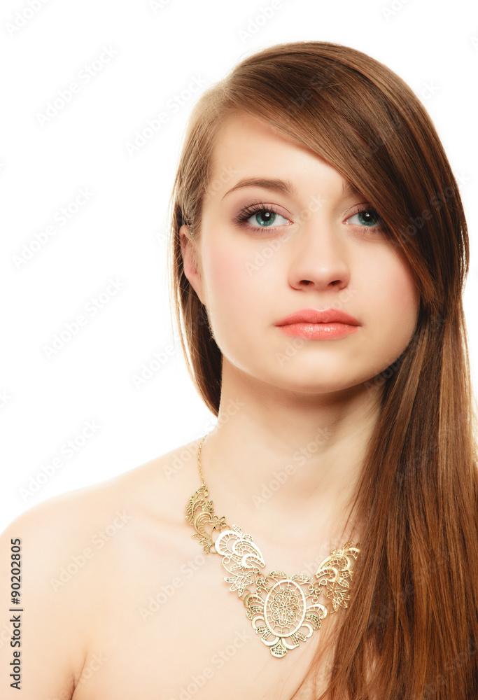 Portrait of girl with bang covering eye in golden necklace