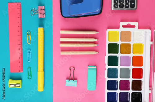 Bright stationery objects on table close up