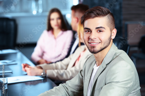 Businessman and business people working in conference room