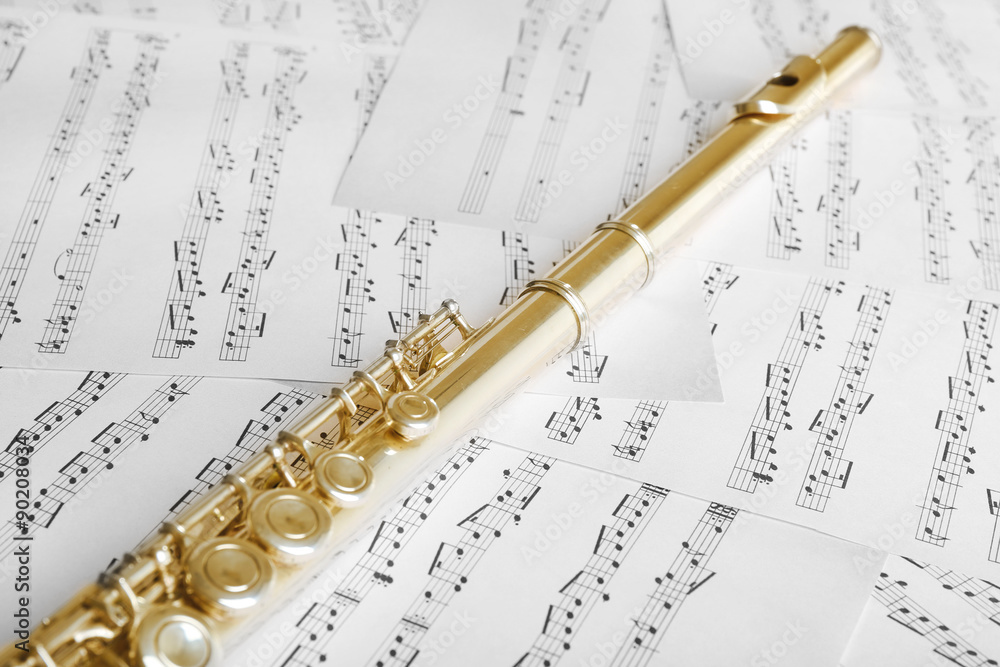 Obraz premium Flute on music notes background