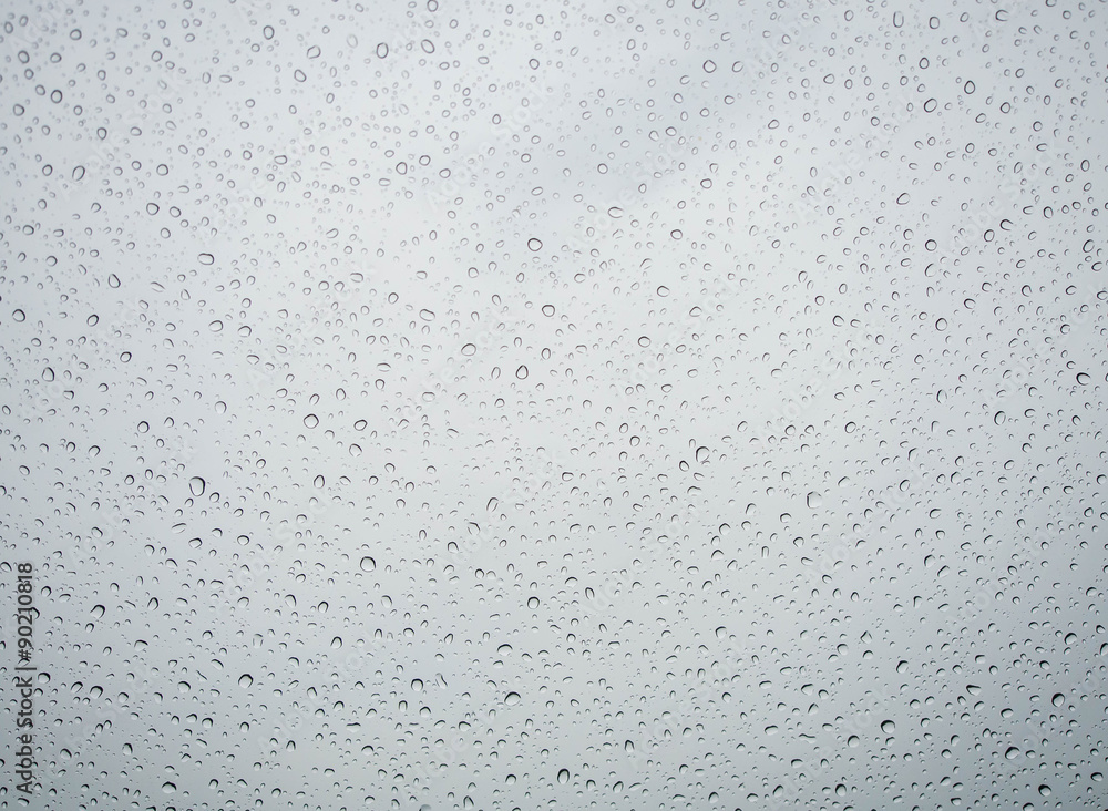 Many of raindrops stuck on the windshield background,Abstract of raindrops on the mirror. Many of raindrops stuck on the windshield background,Abstract of raindrops on the mirror.