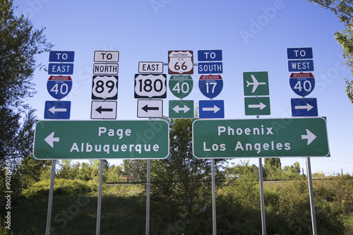 Obraz na plátne Road signs to Interstate 40 and everywhere in all directions in Flagstaff Arizon
