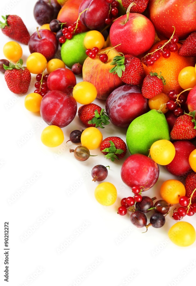 Heap of fresh fruits and berries isolated on white Heap of fresh fruits and berries isolated on white