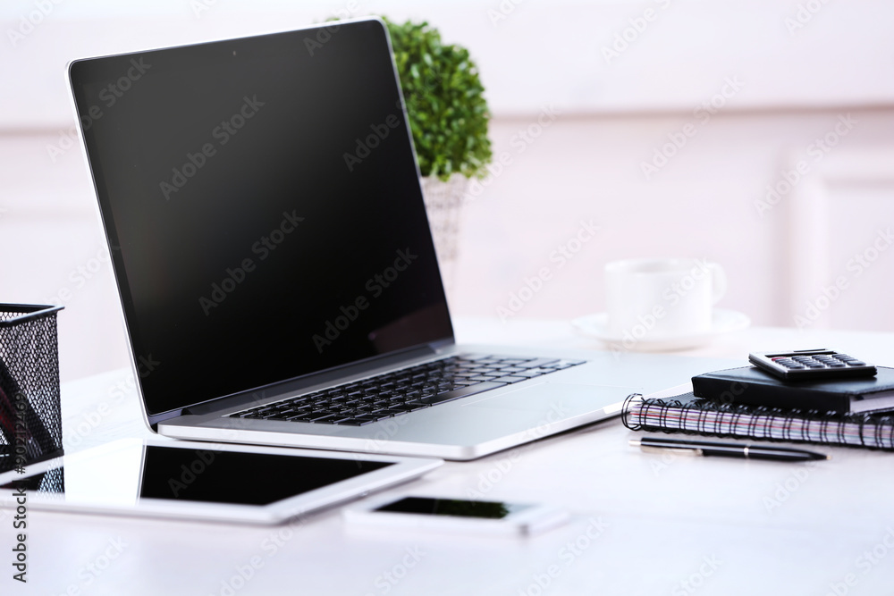 Modern workplace with laptop, close up Modern workplace with laptop, close up