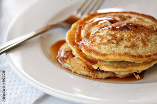 Pancakes with maple syrup, shallow focus
