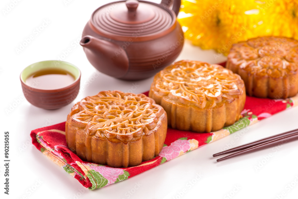 Mooncakes. Traditional Mooncak eand hot tea - Chinese cake Mooncakes. Traditional Mooncak eand hot tea - Chinese cake