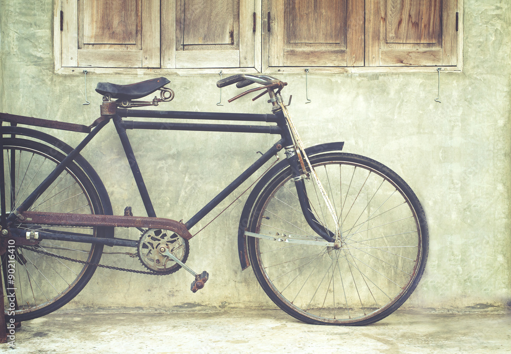 Vintage bicycle in coffee house, film look instagram effect