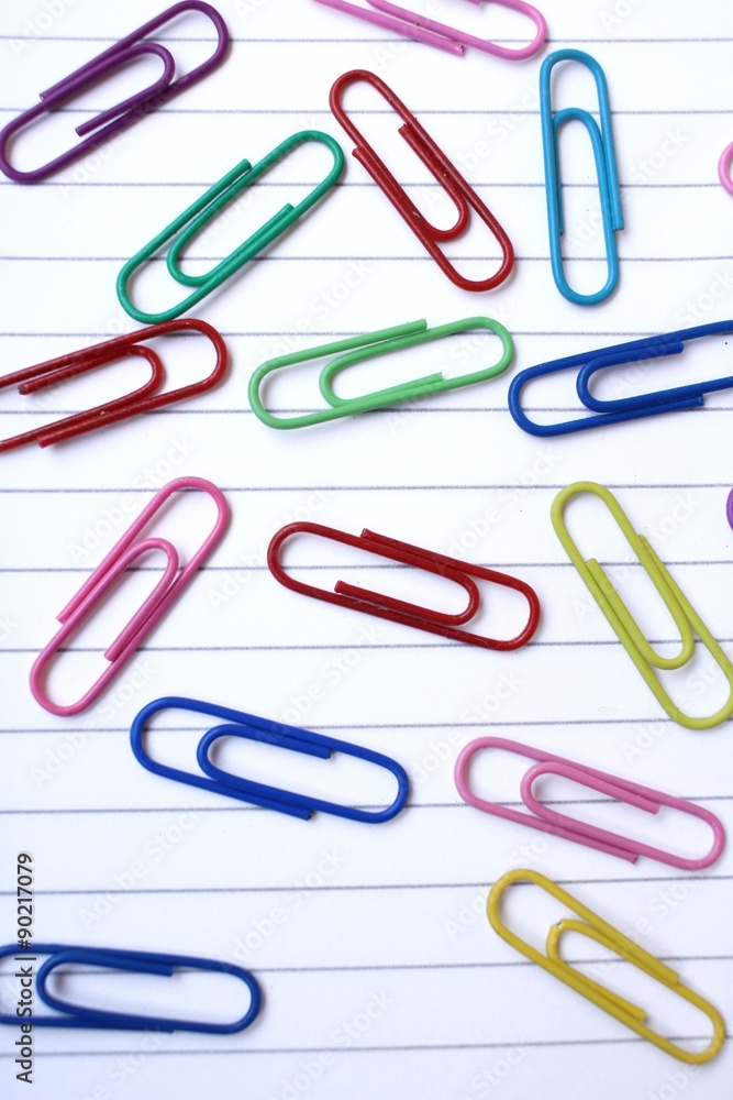 Paper notes with colorful paper clips