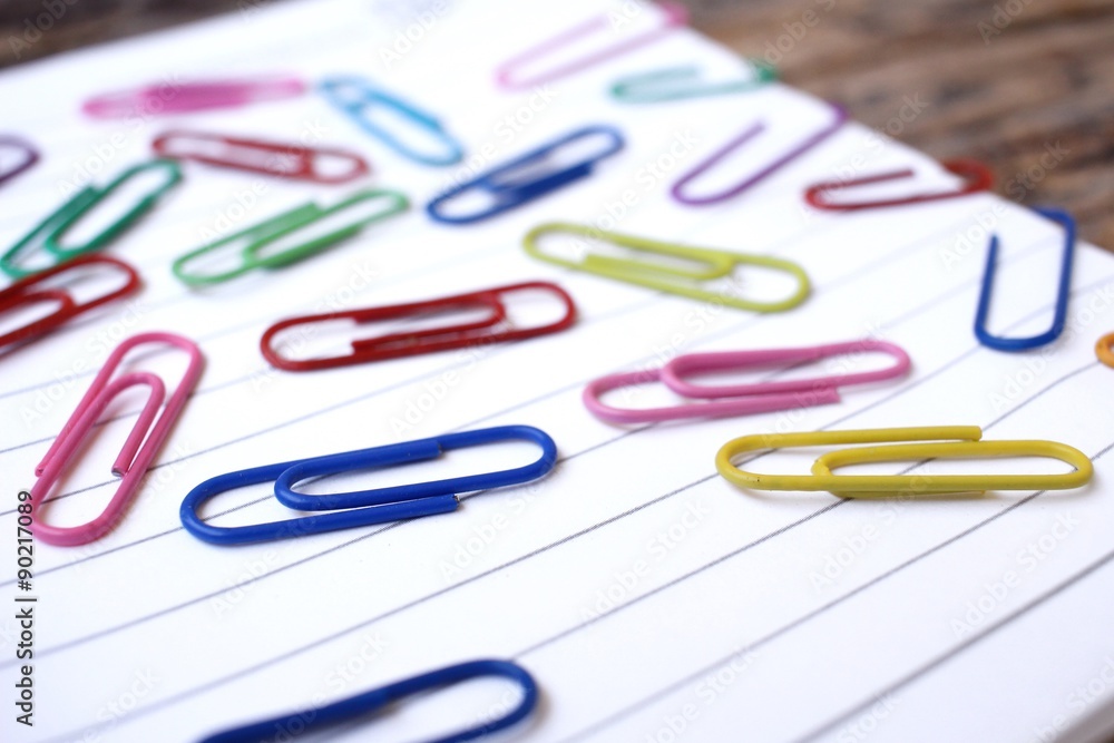 Paper notes with colorful paper clips Paper notes with colorful paper clips