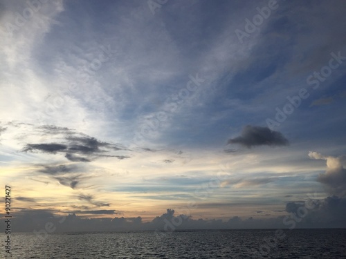 The sky over the tropical ocean during sunset