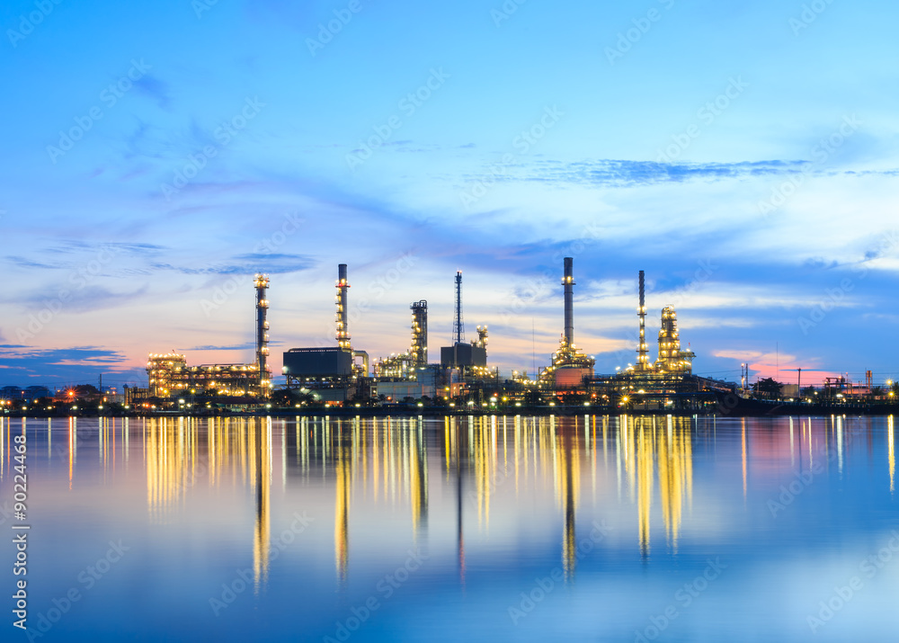 Oil refinery , Petrochemical industrial with city background at sunset , Bangkok , Thailand