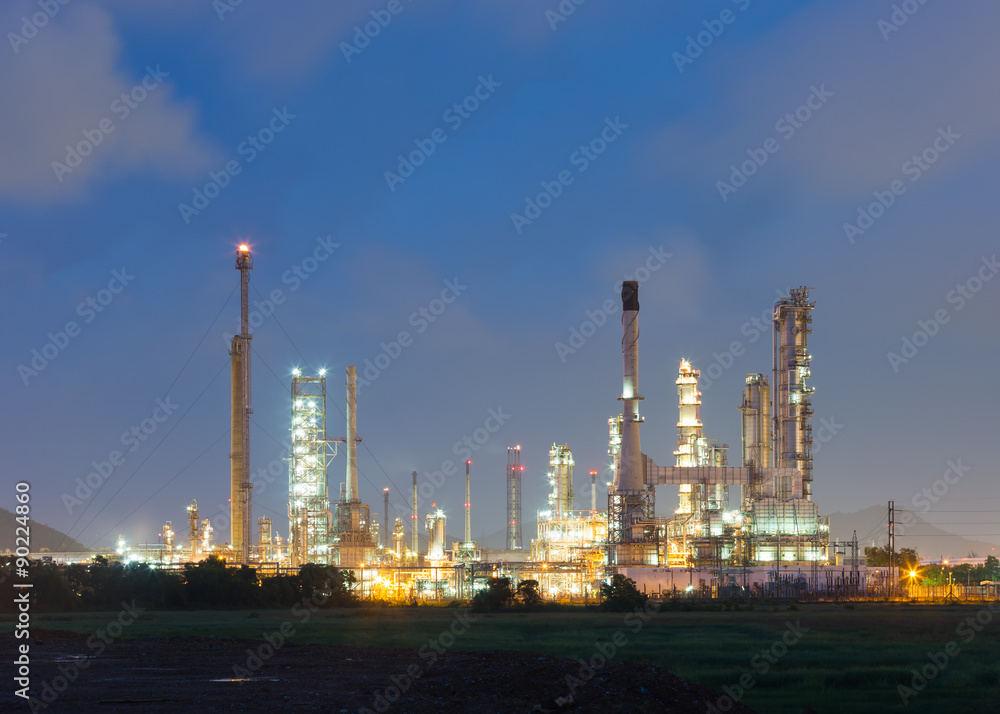 Oil refinery along Chao Phraya river at dusk Bangkok, Thailand