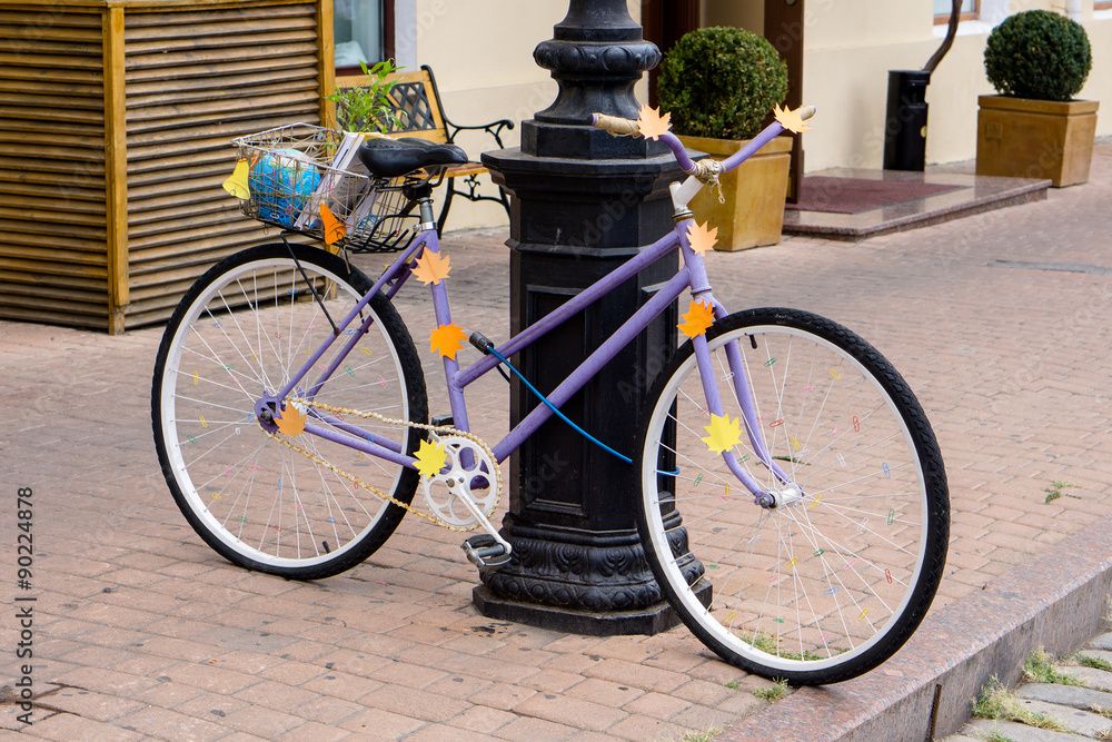 Decorated purple bicycle 
