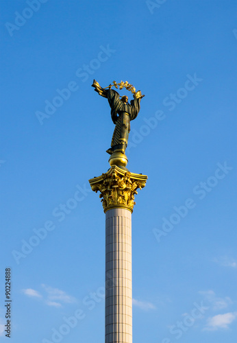 Monument of Independence of Ukraine on blue sky background in Kiev photo