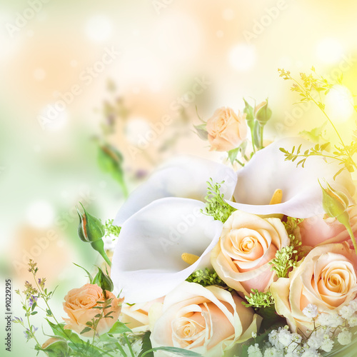 Fototapeta Naklejka Na Ścianę i Meble -  Bouquet for the bride of yellow roses and white calla lilies, floral background.